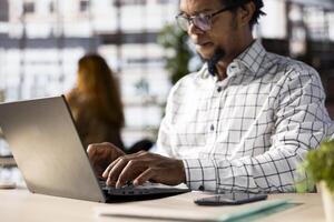 Executive assistant at a multinational company work on next big business project. Professional worker uses data and tech tools to manage operations and ensure a successful enterprise outcome. photo
