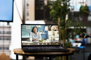 Board of directors holding teleconference meeting with job candidate, asking questions and presenting company background. Human resources employees interviewing for person for open position photo