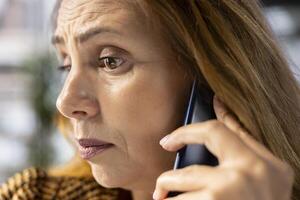 Business executive on a phone call discusses key business tasks, focusing on decision making and budget planning. Manager multitasking business operations and task management efficiently. photo