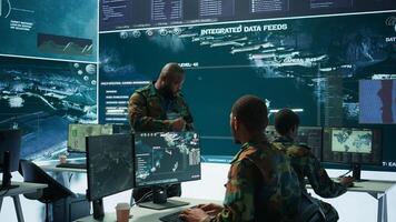 Military officer leads cybersecurity efforts in a high tech control center, ensuring data protection and managing surveillance systems, Coordinating national security operations. Camera B. photo