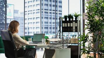 General director searching for an investment solution and the right offer, avoiding trading risks using funds to increase company profit. Entrepreneur planning finances in high end office. Camera B. photo