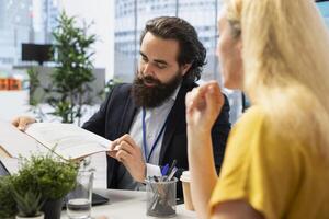 Financial advisor establishing emergency fund for clients before starting investing. Consultant building safety net for customers to provide financial security in case of unexpected expenses photo