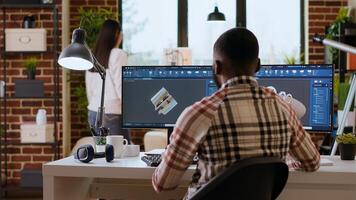 Engineer designs a turbine in an industrial office using CAD software. Working from home with dual monitors and tools for 3D rendering, boosting productivity and technical precision. Camera B. photo