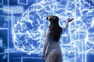 Engineer wearing VR headset, working with artificial intelligence neural networks to process datasets for training. Technician using virtual reality technology supporting AI applications and workloads photo