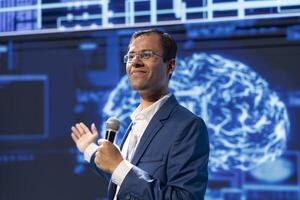 Smiling speaker speaking at tech conference, exploring latest AI technology trends and case studies. Happy IT specialist presenting how artificial intelligence is shaping future during event photo