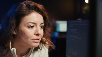 Worried cybersecurity expert pouting after finding many security vulnerabilities, scared of malware infections. Anxious developer distressed by cyber attacks on computer systems, camera B photo