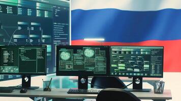 Governmental cyber operations room with Russian flag on big screen, focusing on information war and trolling. Highlighting the role of hackers in spreading disinformation and crowd control. Camera A. photo