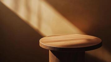 A wooden stool in front of a wall photo