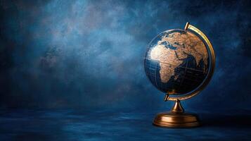 World globe on blue background photo