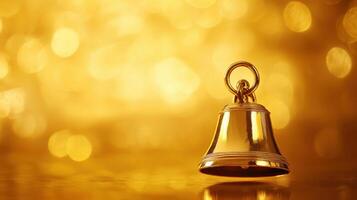 Golden bell shines brightly against a sparkling golden background creating a festive atmosphere photo