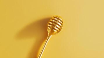 Honey dripping from a spoon onto a vibrant yellow background showcasing texture and color photo