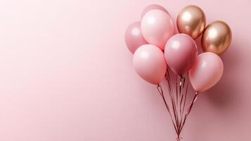 Colorful balloons in pink hues with a touch of gold for a festive celebration backdrop photo