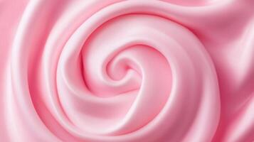 Smooth pink satin fabric creates a soft swirl pattern for elegant design projects and fashion applications photo