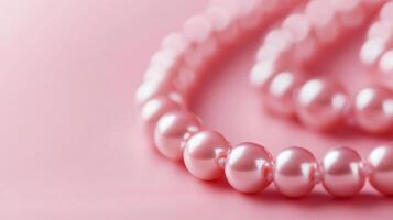 Elegant pink pearl necklace on a soft pastel background adds a touch of sophistication to any outfit photo