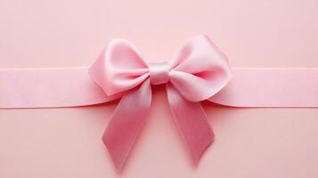 Beautiful pink ribbon bow on a soft pastel background perfect for gift wrapping or decoration ideas photo