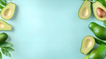 Fresh Avocados on a Light Blue Background with Green Leaves photo