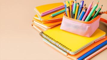 Bright Stationery Items with Colorful Pencils and Notebooks photo