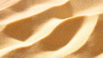 Textured Golden Sand with Gentle Waves and Soft Curves photo