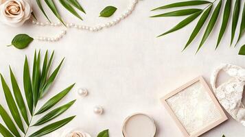 Elegant flat lay with flowers, leaves, and decorative items photo
