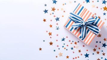 Colorful Gift Box with Ribbon Surrounded by Festive Stars Confetti photo