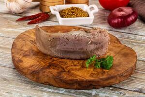 Steamed pork tongue with mustard photo