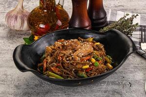 Soba with shredded pork and vegetables photo