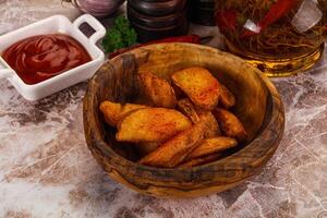 Fried rustic golden Idaho potato photo