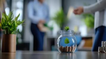 Growth of Investment Concept with Coins and Green Plant in Jar photo
