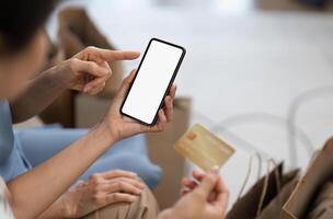 Mother and Child Shopping Online with Smartphone App - White Screen Concept for E-commerce and Digital Shopping Experience photo