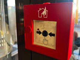 Close-up of a Fire Alarm Button in a Public Space photo