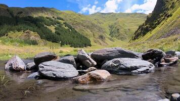 Timelapse of the rocky river in the mountains valley video