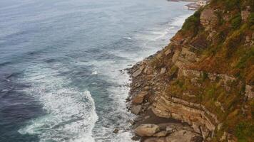 Aerial view of the high coastline. Cliffs and sea from above video