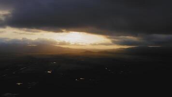 A view from a drone of a beautiful sunset in the valleys with the river video