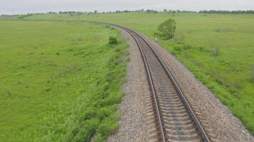 Empty straight one-way railways on a summer sunny day video
