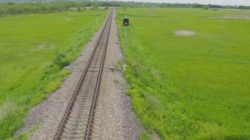 Empty straight one-way railways on a summer sunny day video