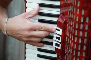 Technique And Ability Of A Professional Accordion Player photo