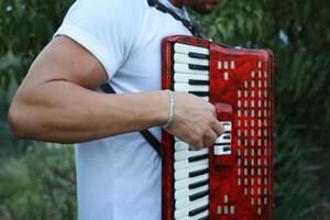 Technique And Ability Of A Professional Accordion Player photo