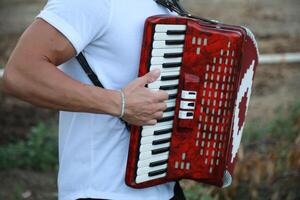 Technique And Ability Of A Professional Accordion Player photo
