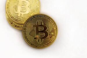 bitcoin cryptocurrency on white background. bitcoin with metal material like gold color. Bitcoin is a digital asset for investing photo