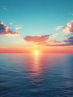 Vibrant sunset illuminating calm ocean waters with colorful sky photo