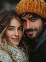 Romantic couple under gently falling snowflakes photo