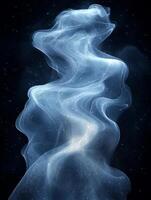 Blue smoke creating shapes on black photo