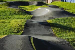 Explore the thrilling world of Dynamic Pump Track Design, specially crafted for BMX and Skateboarding enthusiasts seeking adventure and fitness photo