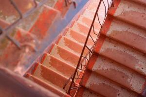 Discover the Spiral Staircase Perspective with Rustic Tile accents, showcasing fine craftsmanship photo