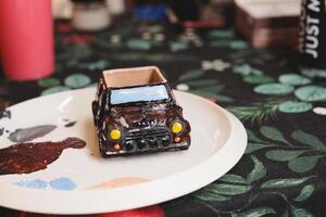 This is a HandPainted Miniature Car beautifully displayed on a Decorative Plate for decoration photo