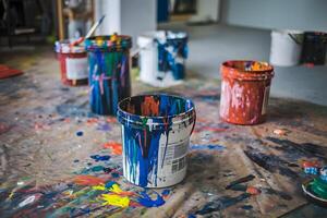 Art space with paint splatters, colorful chaos, radiates unstructured creativity and spontaneity photo