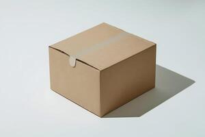 Plain brown box on white surface, simple design evoking practicality and functionality photo