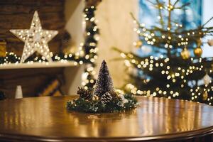 A warm festive setting with a polished wooden table and Christmas tree glowing softly photo