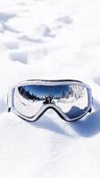 Reflective Ski Goggles on Pristine Snow photo