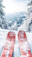 Snowy Mountain Peaks with Red Ski Equipment photo